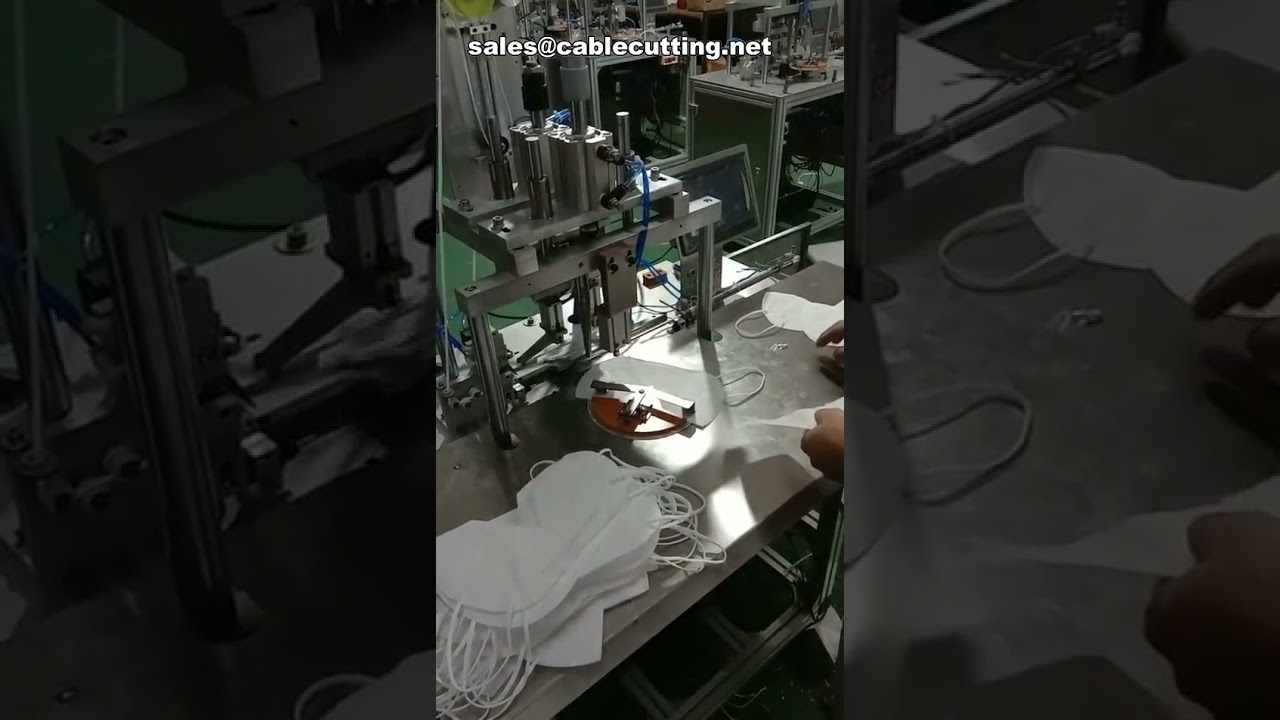 Macchina automatica saldatrice a punti per mascherine N95, FFP2 e usa e getta con occhielli
