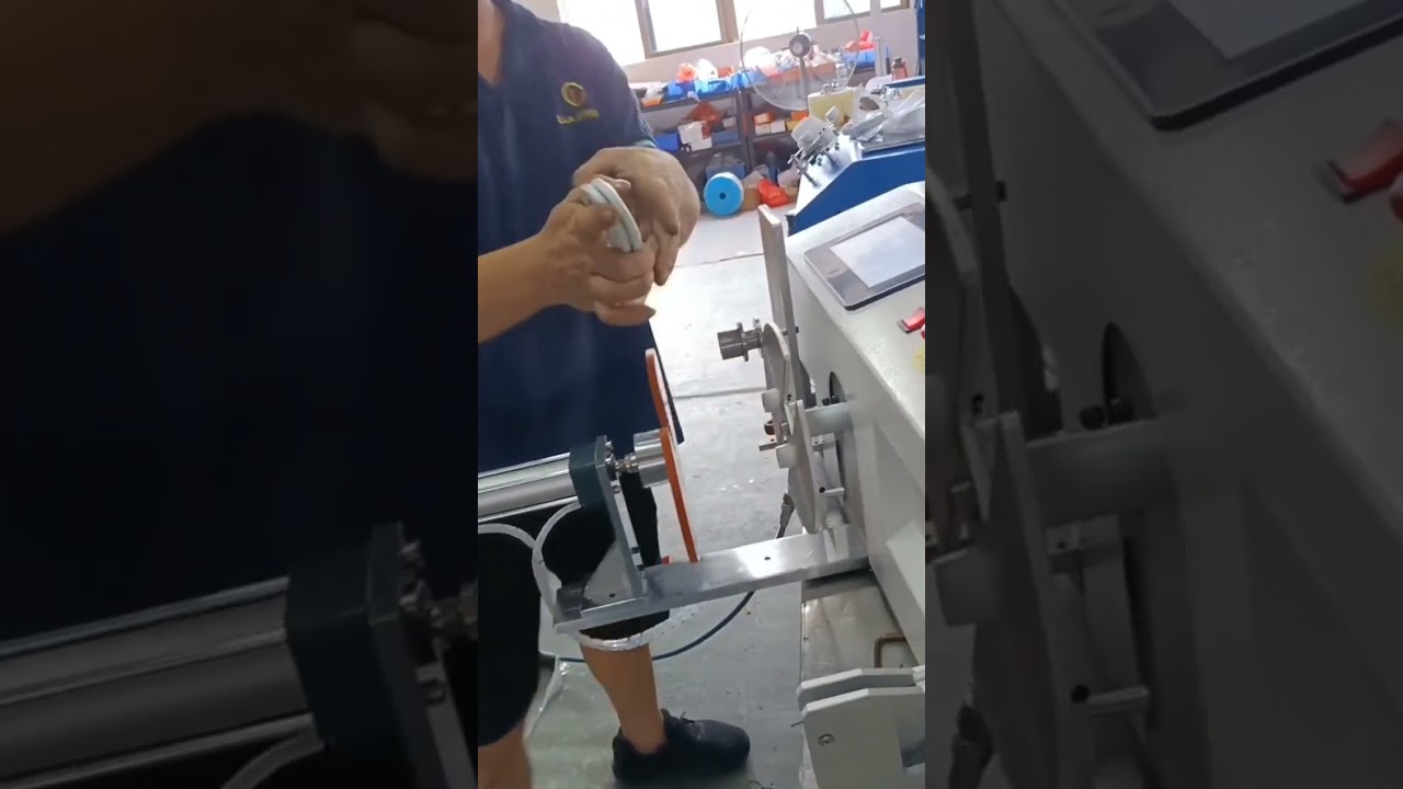 Macchina per avvolgere e legare cavi dati: automazione industriale #fabbrica #macchina